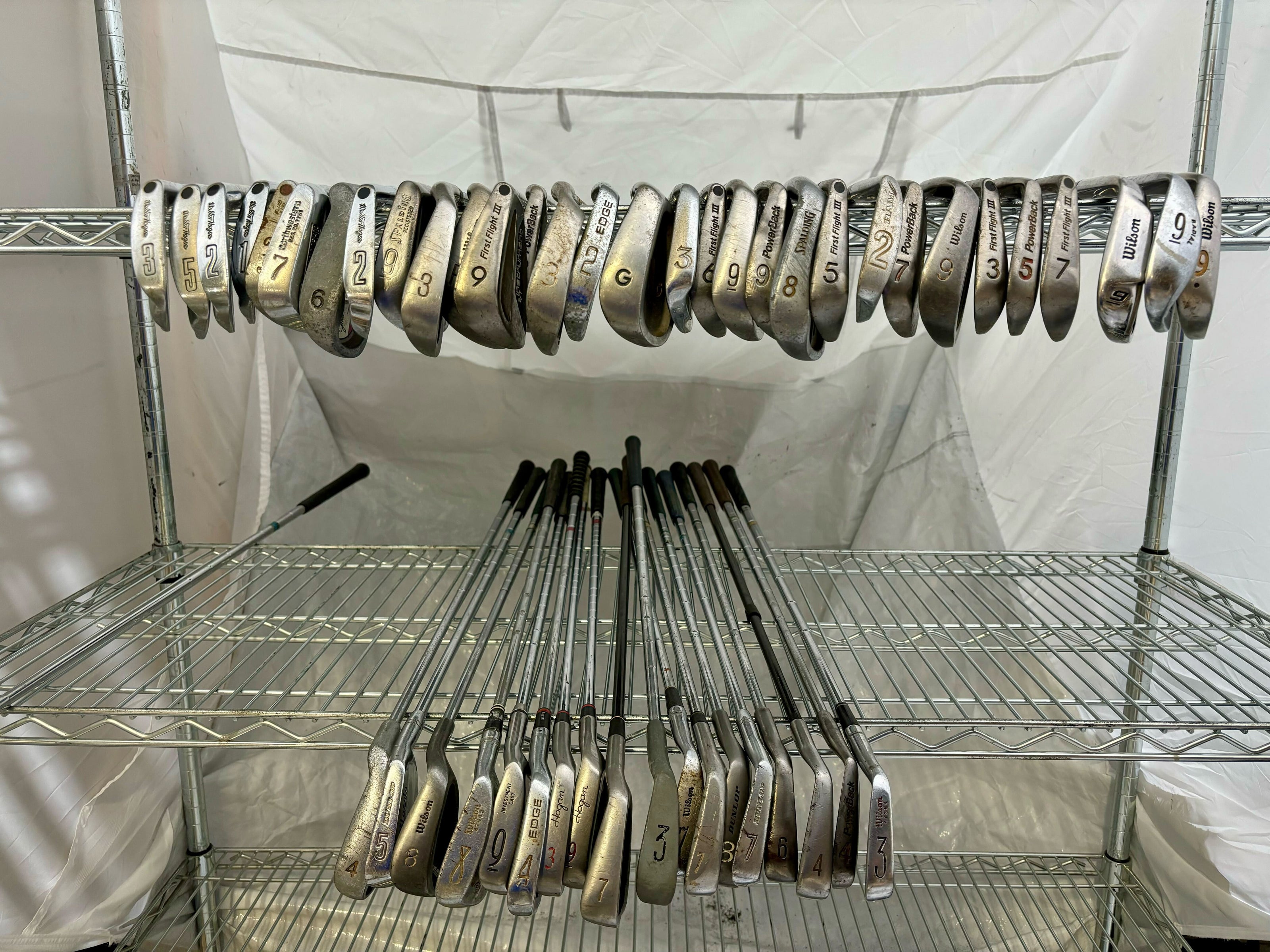 Wholesale Lot of 50 Golf Clubs - Assorted Single Irons and Wedges.-Next Round