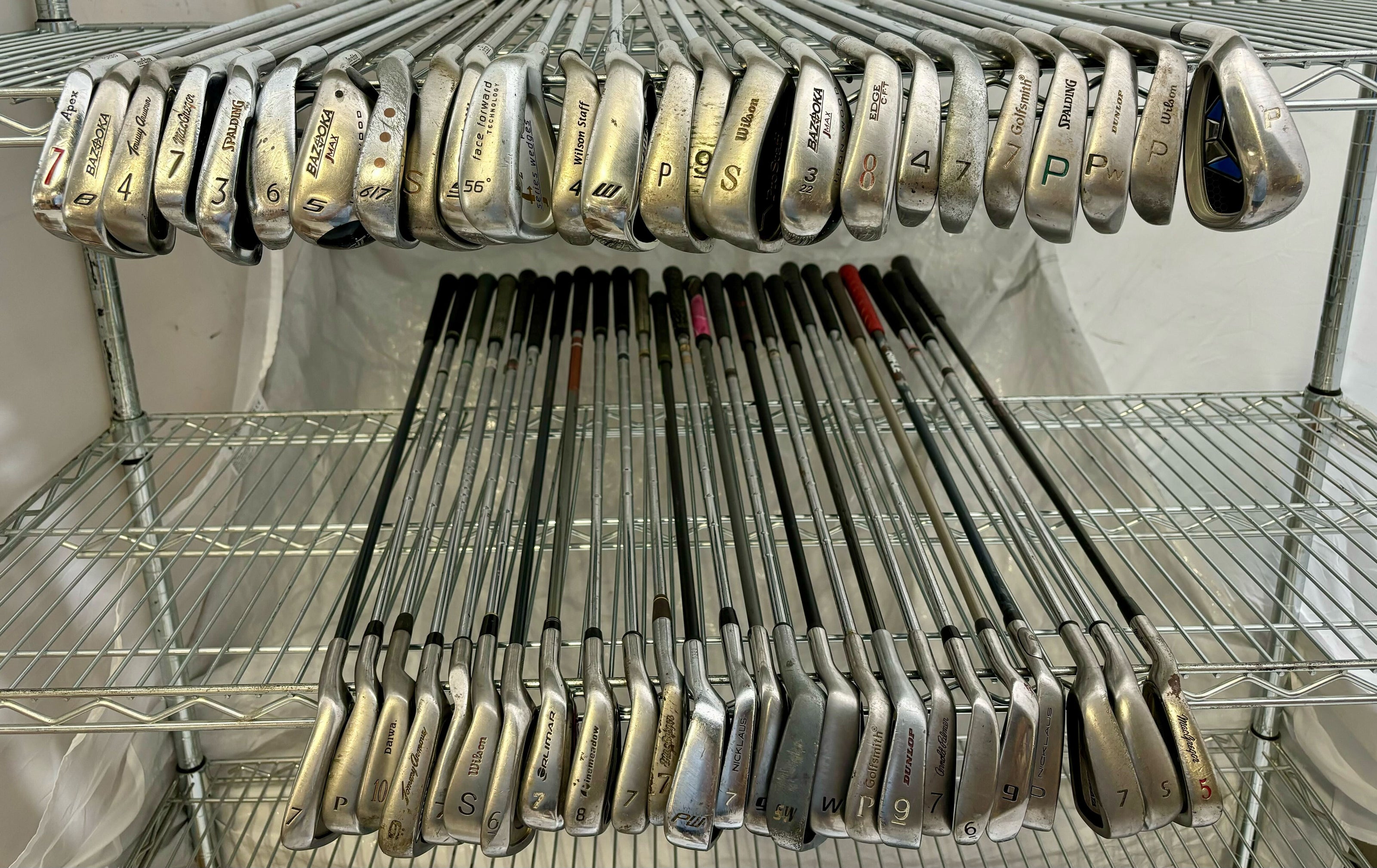 Wholesale Lot of 50 Golf Clubs - Assorted Irons and Wedges-Next Round