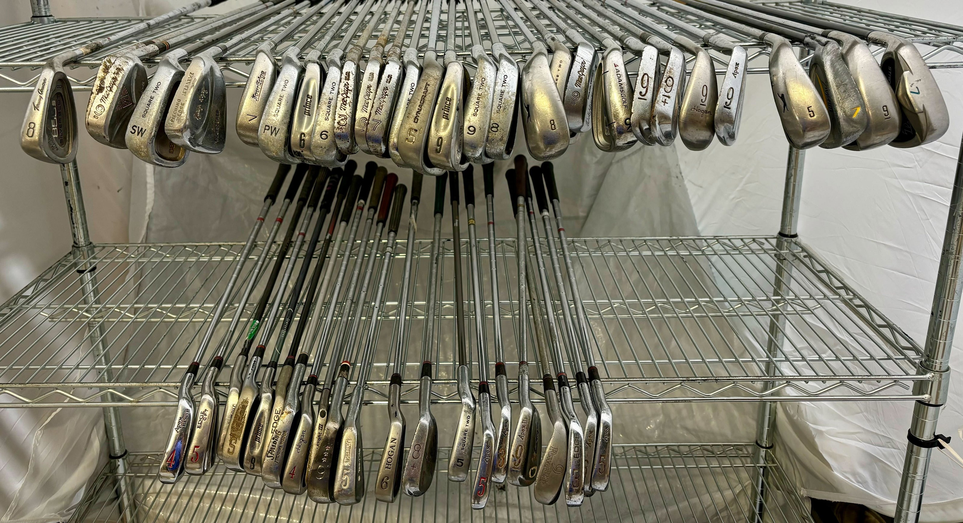 Wholesale Lot of 50 Golf Clubs - Assorted Single Irons and Wedges.-Next Round