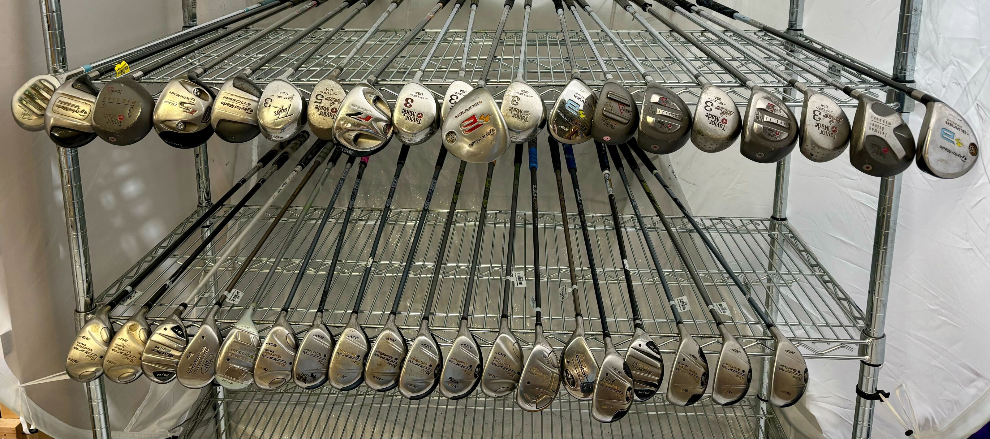 Wholesale Lot of 40 Golf Clubs - TaylorMade Woods and Cobra Baffler Hybrids-Next Round