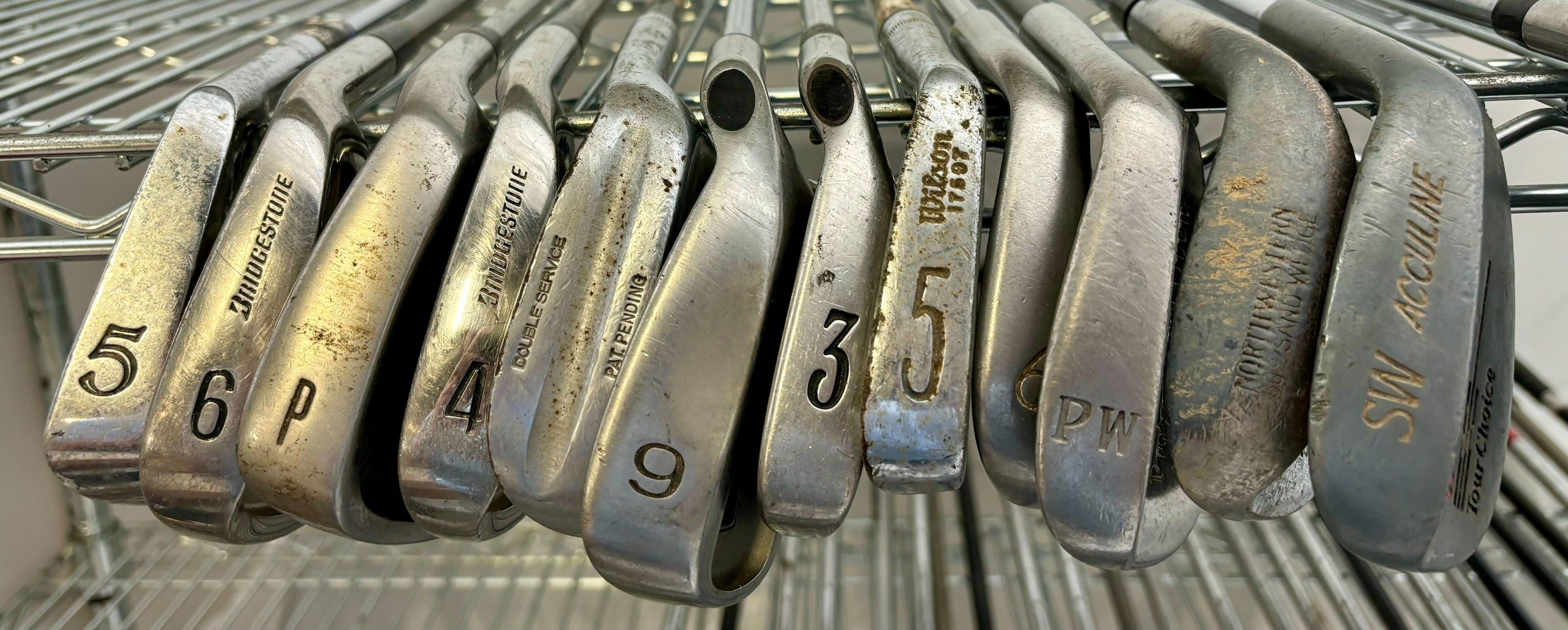 Wholesale Lot of 50 Golf Clubs - Assorted Irons and Wedges-Next Round