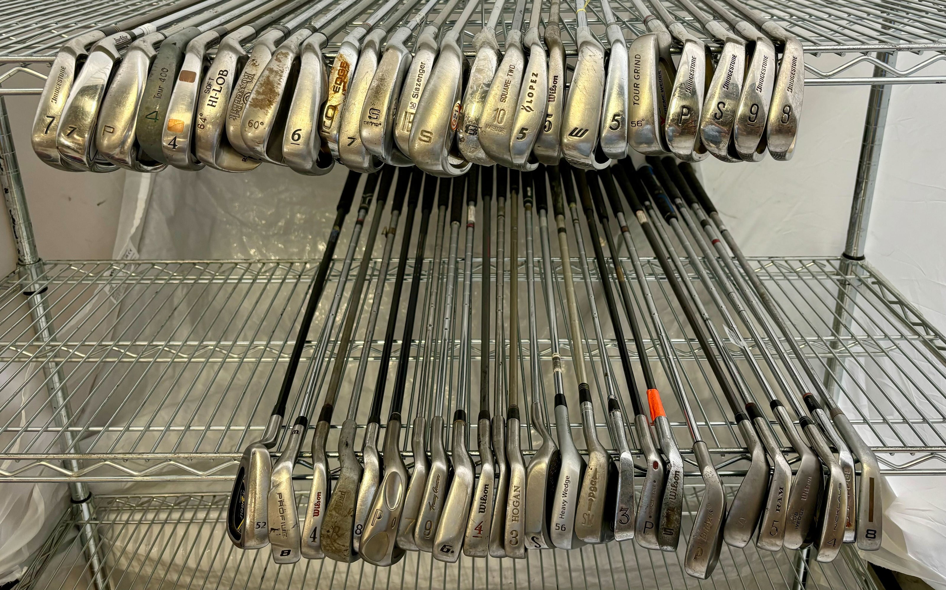 Wholesale Lot of 50 Golf Clubs - Assorted Irons and Wedges-Next Round