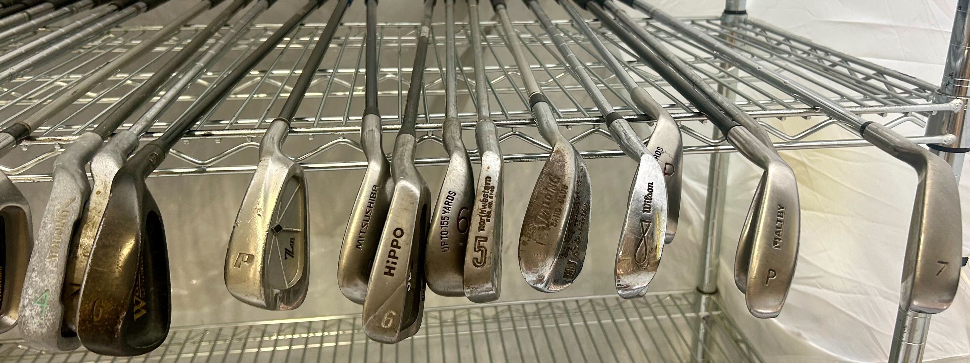 Wholesale Lot of 50 Golf Clubs - Left and Right-Handed Wilson Assorted Irons-Next Round