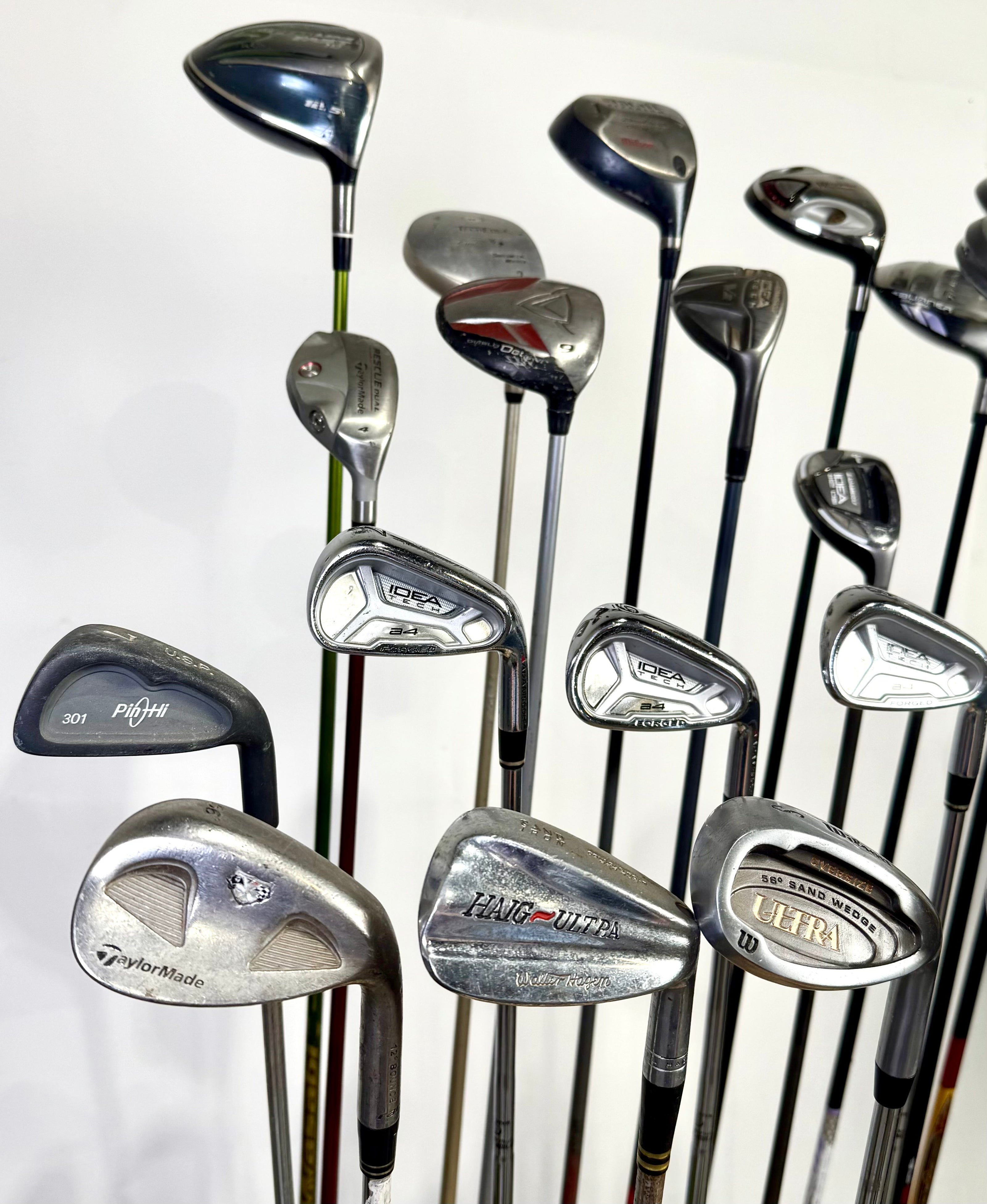 Wholesale Lot of 24 Golf Clubs - Assorted Right-Handed Drivers, Woods, and Irons