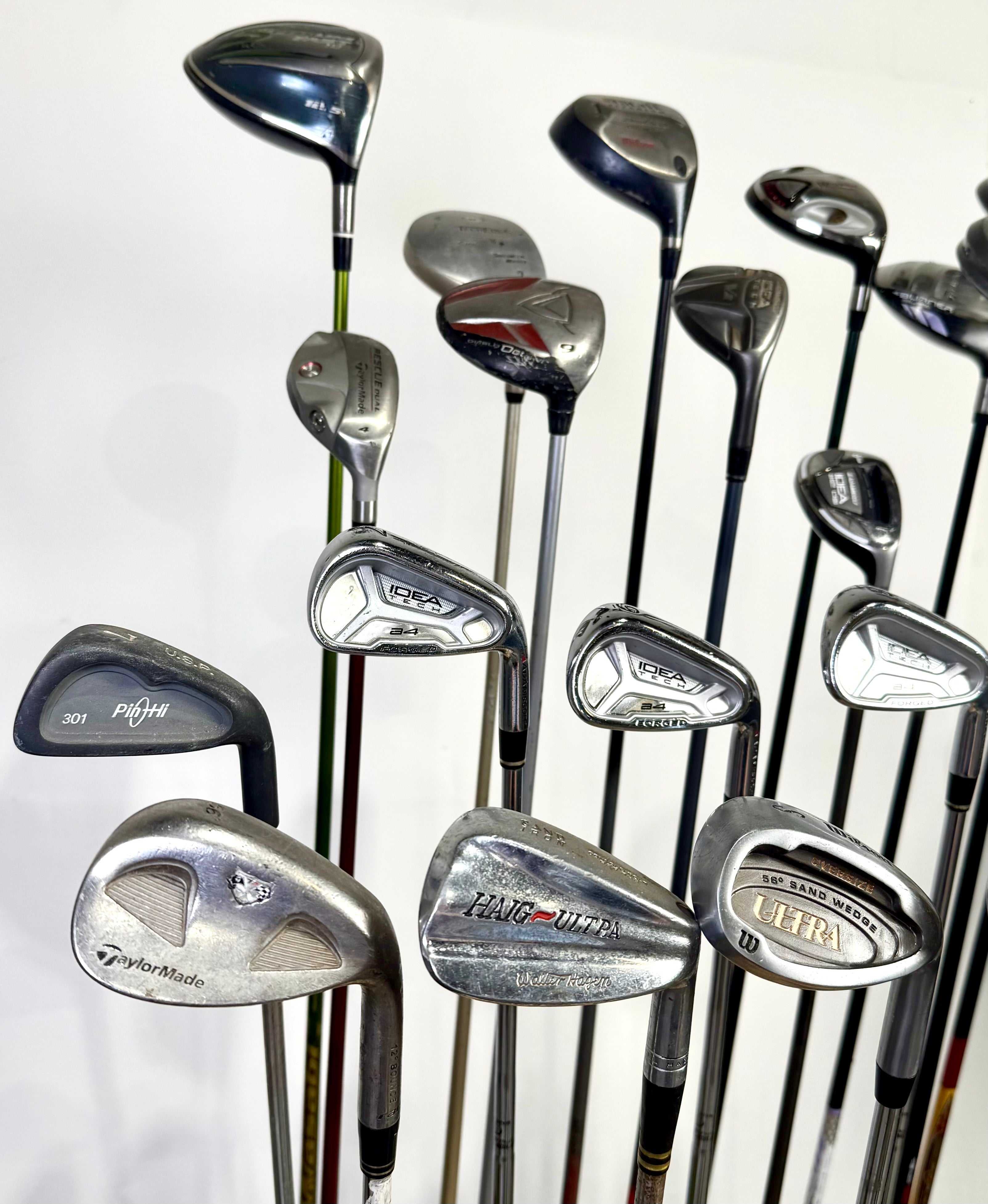 Wholesale Lot of 24 Golf Clubs - Assorted Right-Handed Drivers, Woods, and Irons