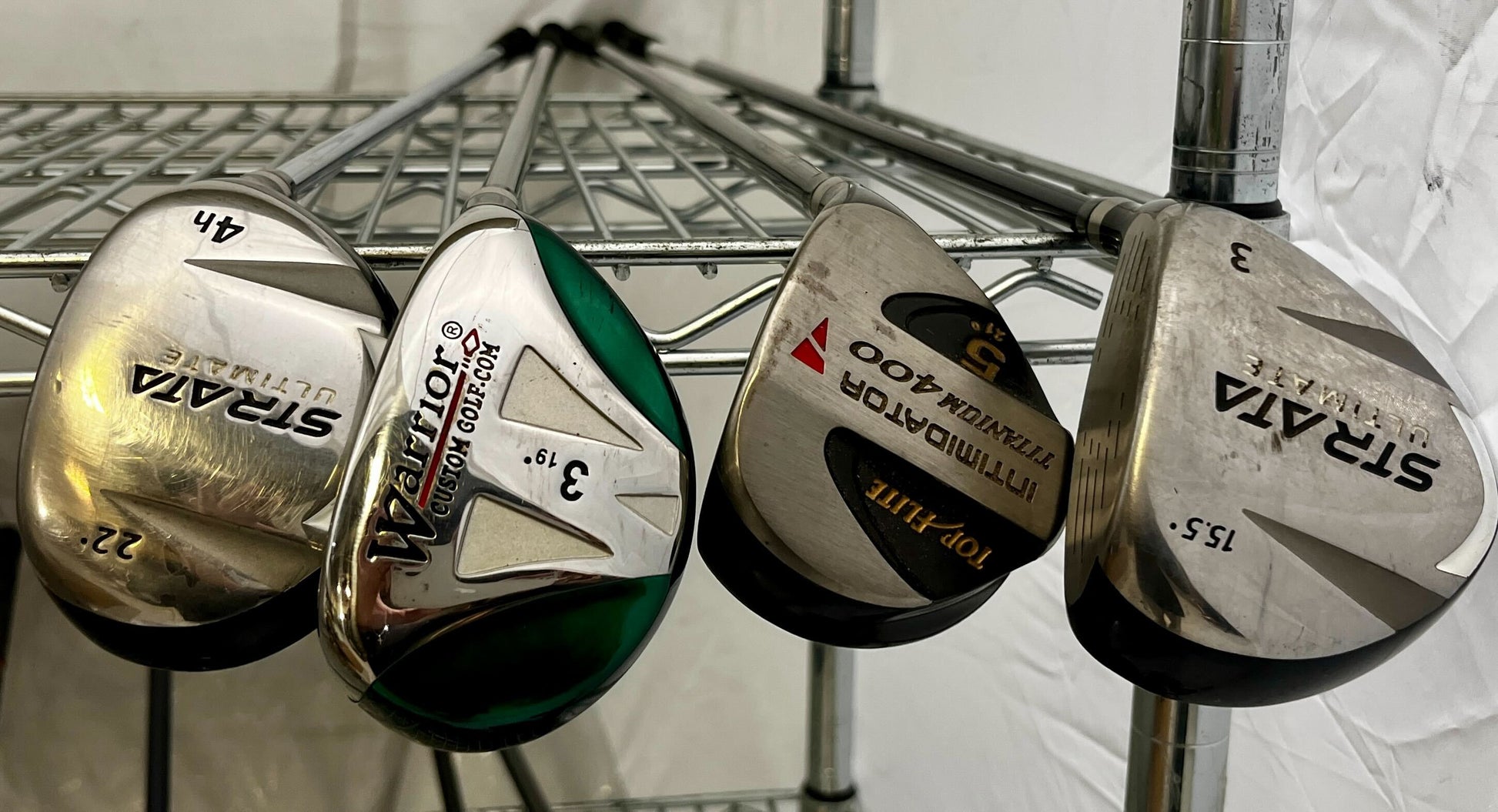 Wholesale Lot of 30 Golf Clubs - Assorted Hybrids, Woods, and Drivers-Next Round
