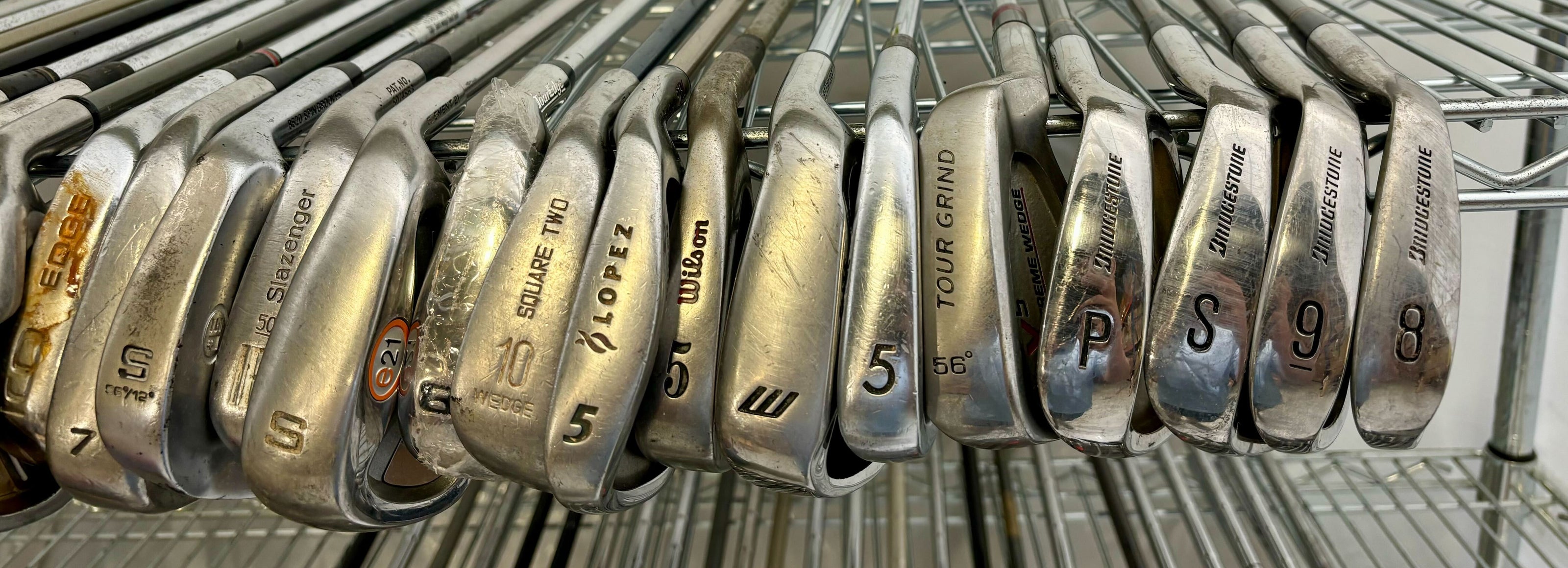 Wholesale Lot of 50 Golf Clubs - Assorted Irons and Wedges-Next Round