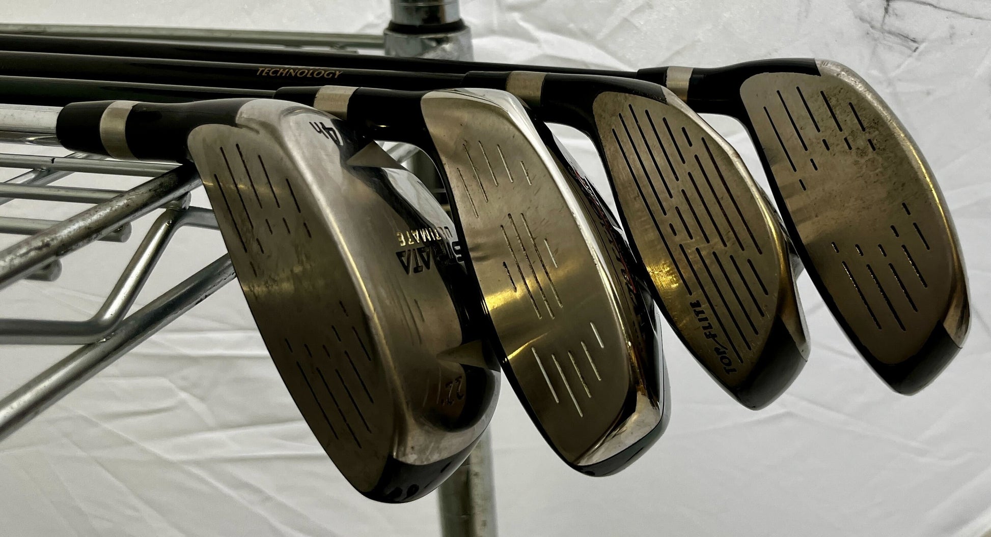 Wholesale Lot of 30 Golf Clubs - Assorted Hybrids, Woods, and Drivers-Next Round