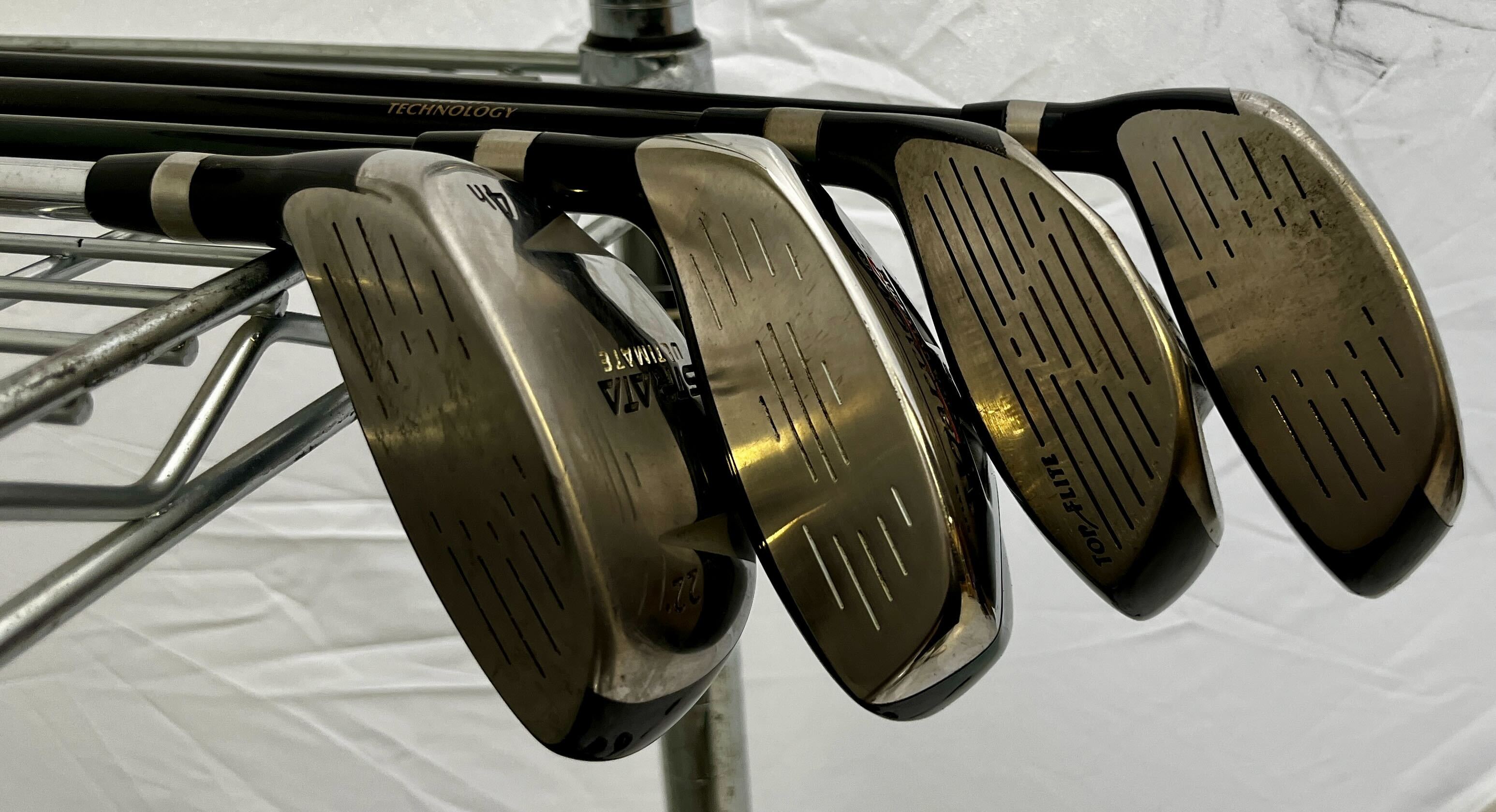 Wholesale Lot of 30 Golf Clubs - Assorted Hybrids, Woods, and Drivers-Next Round