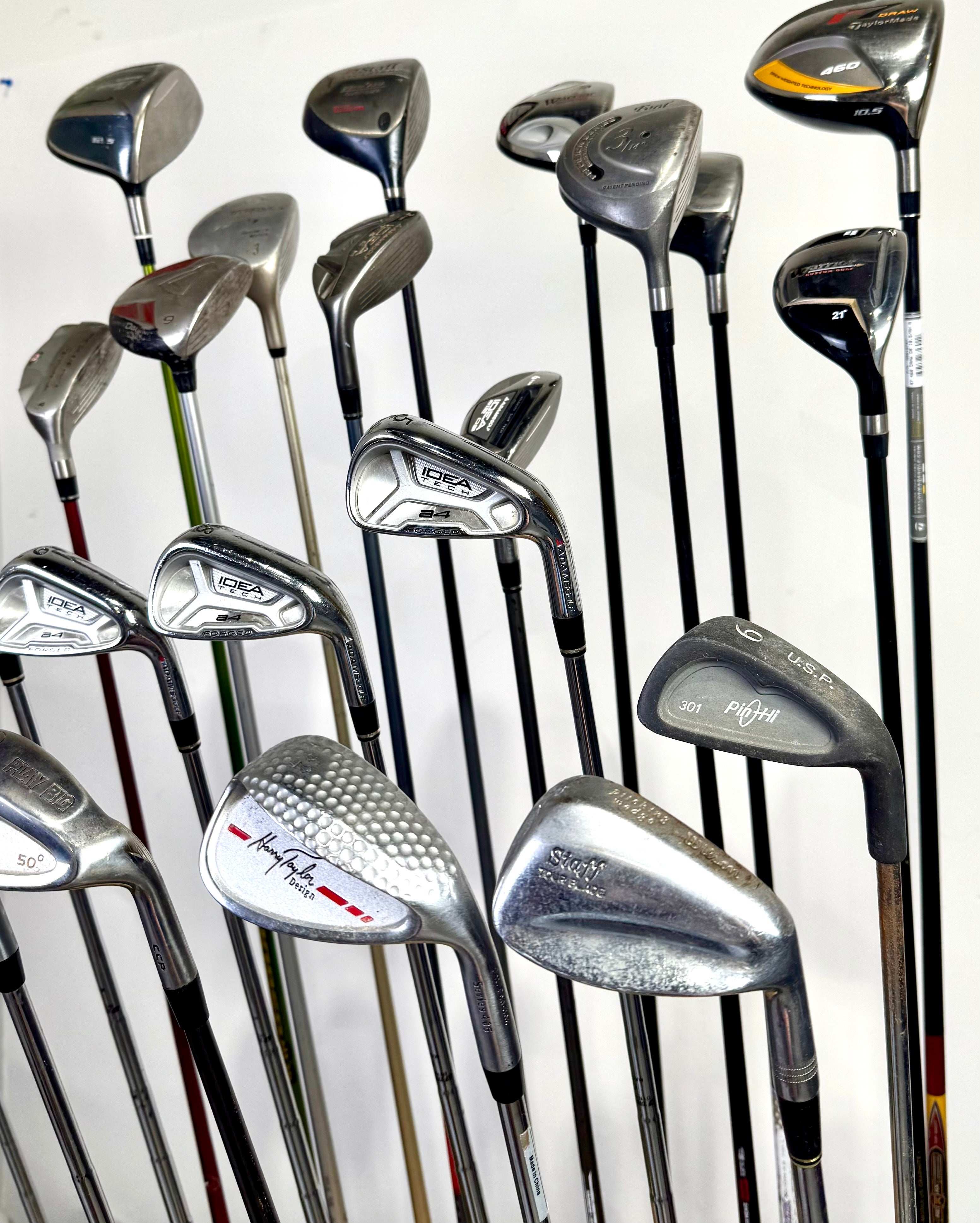 Wholesale Lot of 24 Golf Clubs - Assorted Right-Handed Drivers, Woods, and Irons