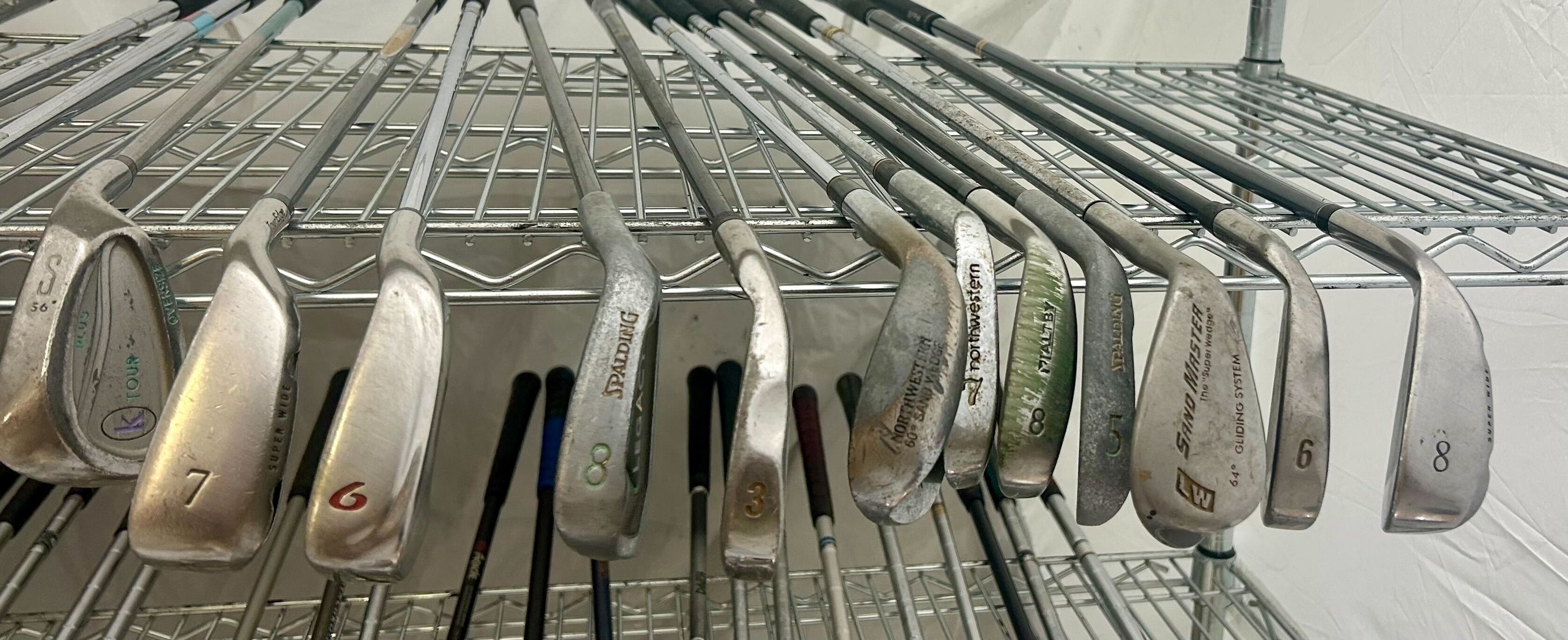 Wholesale Lot of 50 Golf Clubs - Left and Right-Handed Wilson Assorted Irons-Next Round