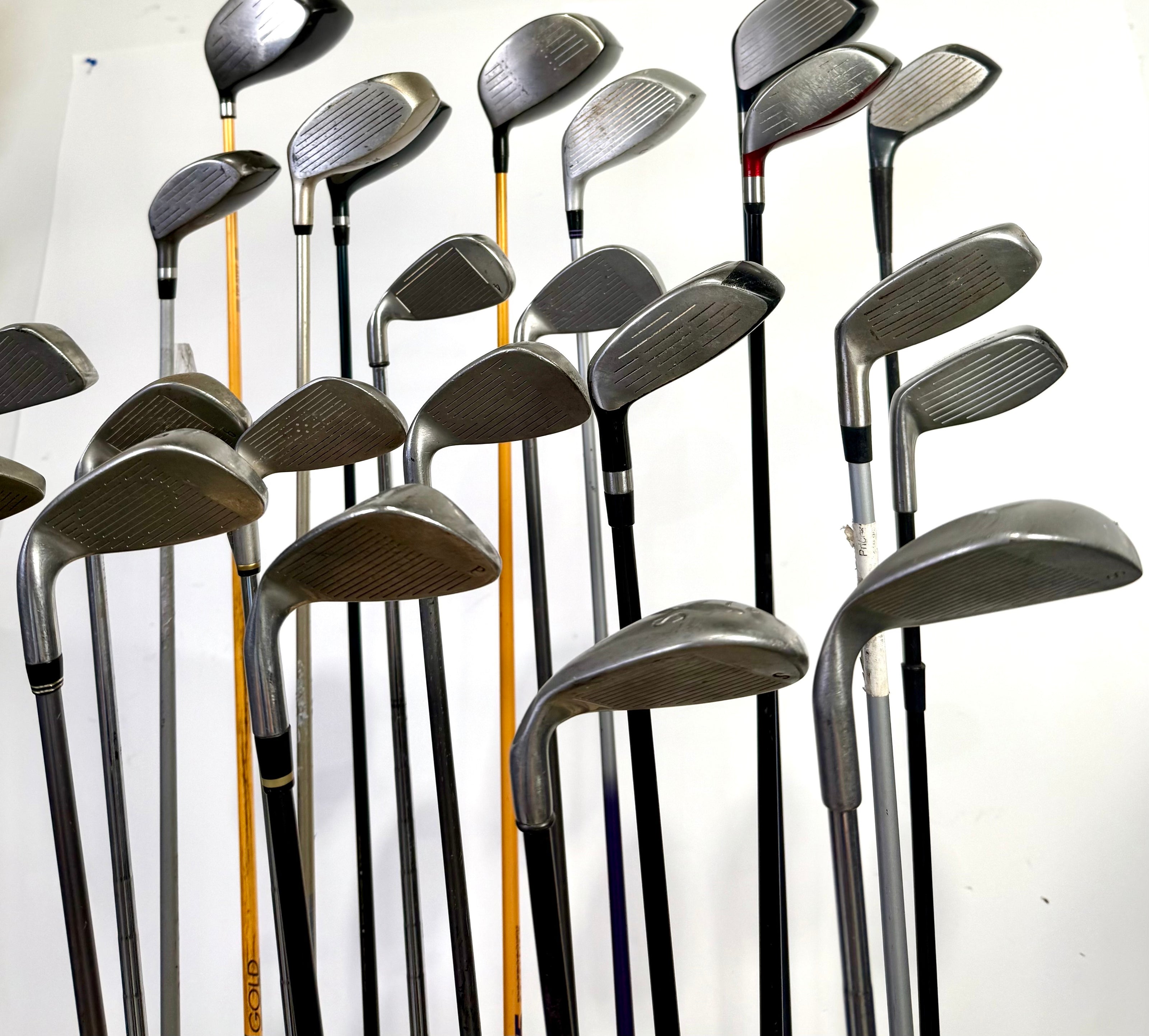 Wholesale Lot of 24 Golf Clubs - Assorted Right-Handed Drivers, Woods, and Irons